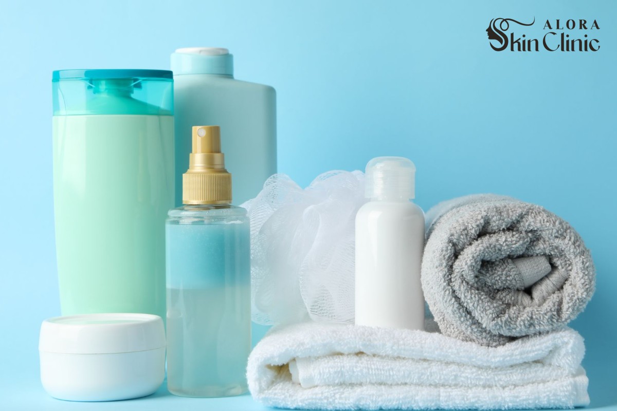 Skincare aftercare products including bottles, cream and towels, representing gentle care between laser hair removal sessions